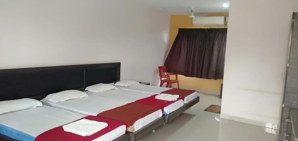 Iroomz Hoysala Residency Белларі Екстер'єр фото